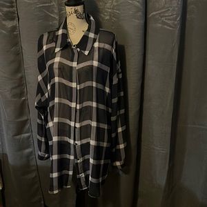 Navy Blue and white, see-through button-up shirt.